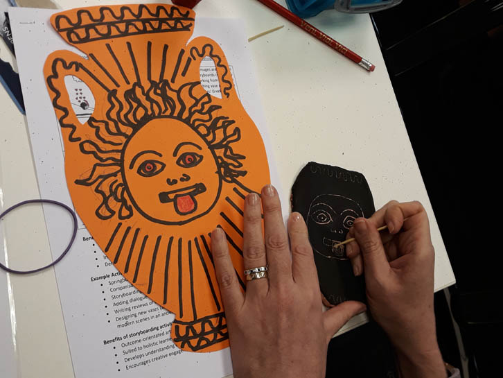 Gorgon vase! drawing of a gorgon head on a card vase shape