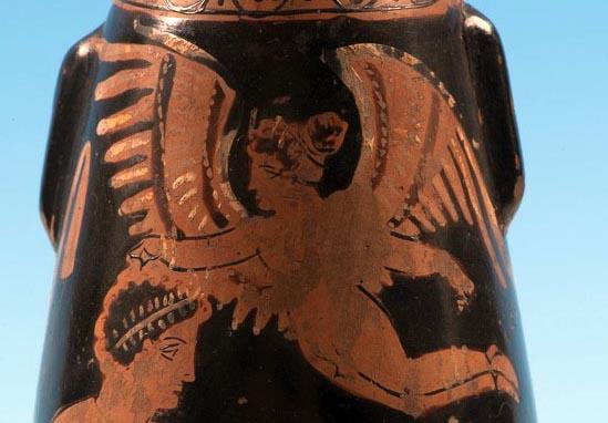 Red figure vase with winged goddess