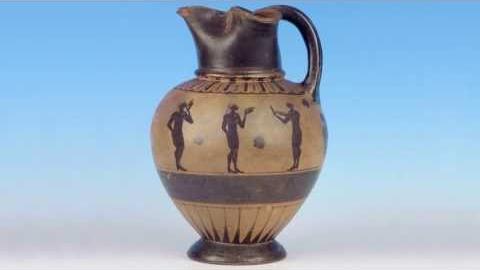 Three black-figure men drinking naked